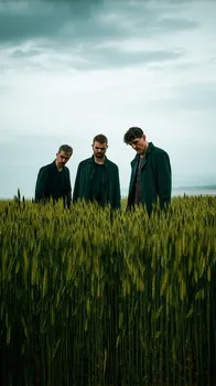 Horrified Men in Tall Grass